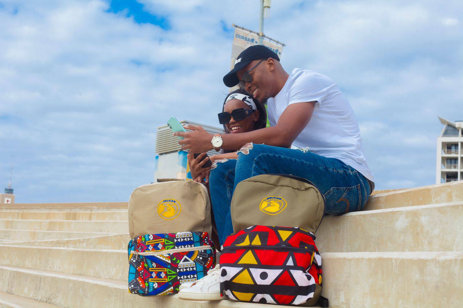 Couple with Pelican bags on Durban beachfront